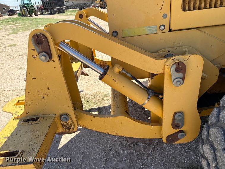 image for item EP0552 1999 John Deere 772CH motor grader