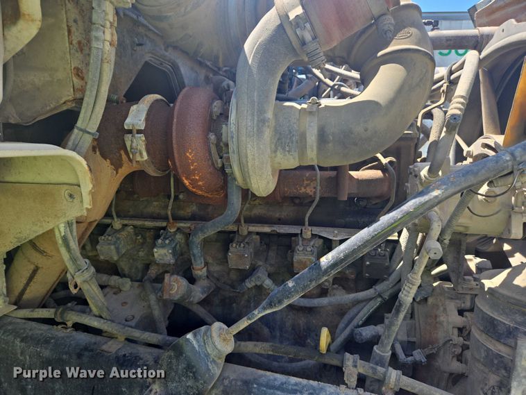 image for item YA1060 2004 Mack DM600 ready mix truck