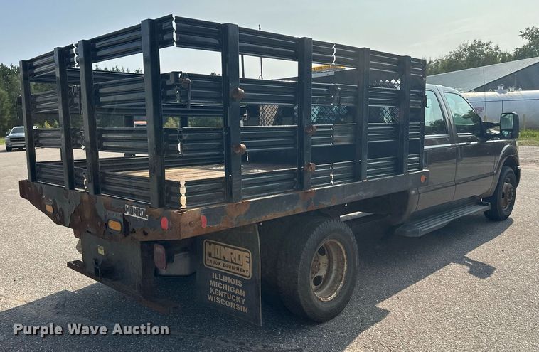 image for item DT6304 2015 Ford F350 Super Duty  Crew Cab flatbed pickup truck