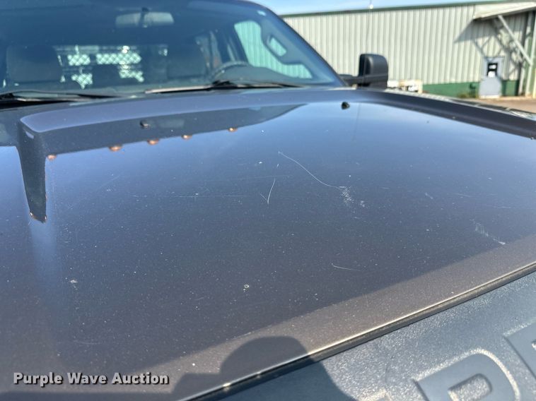 image for item DT6304 2015 Ford F350 Super Duty  Crew Cab flatbed pickup truck