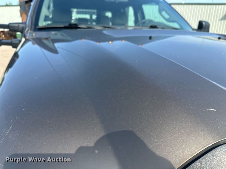 image for item DT6304 2015 Ford F350 Super Duty  Crew Cab flatbed pickup truck