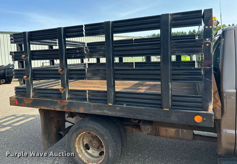 image for item DT6304 2015 Ford F350 Super Duty  Crew Cab flatbed pickup truck