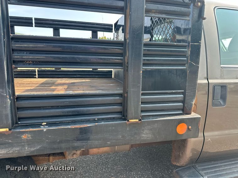 image for item DT6304 2015 Ford F350 Super Duty  Crew Cab flatbed pickup truck