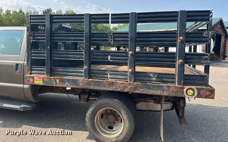 image for item DT6304 2015 Ford F350 Super Duty  Crew Cab flatbed pickup truck