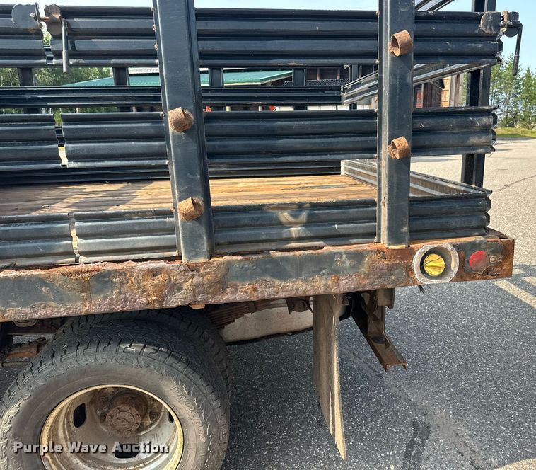 image for item DT6304 2015 Ford F350 Super Duty  Crew Cab flatbed pickup truck