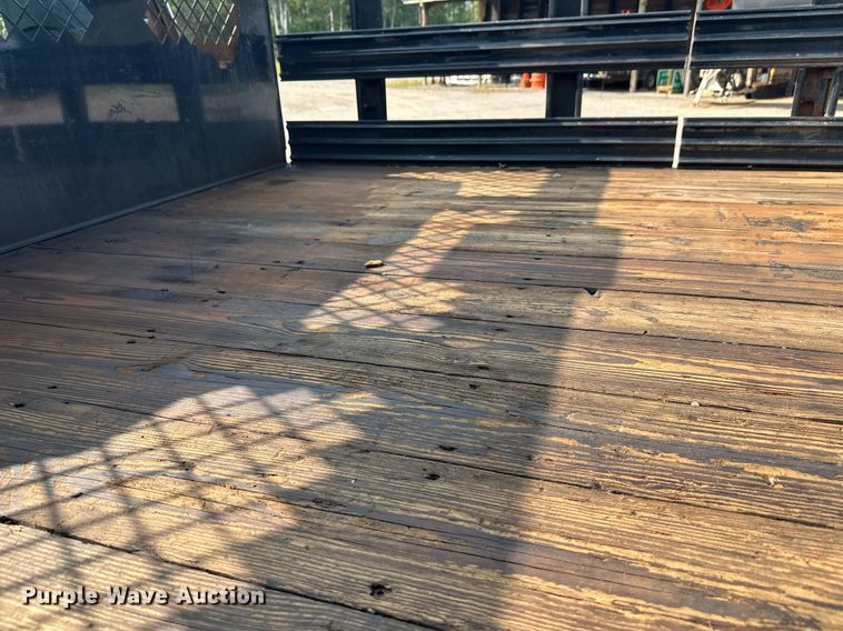 image for item DT6304 2015 Ford F350 Super Duty  Crew Cab flatbed pickup truck