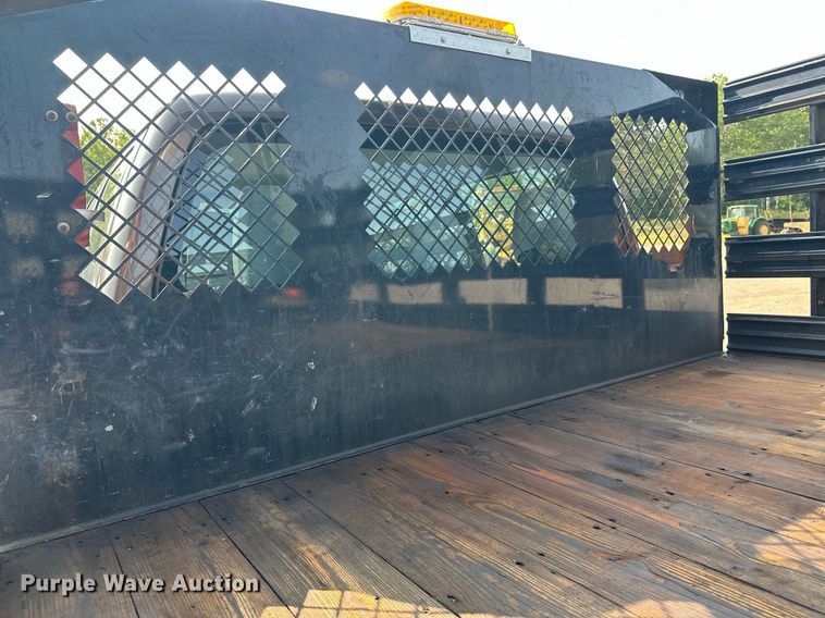 image for item DT6304 2015 Ford F350 Super Duty  Crew Cab flatbed pickup truck