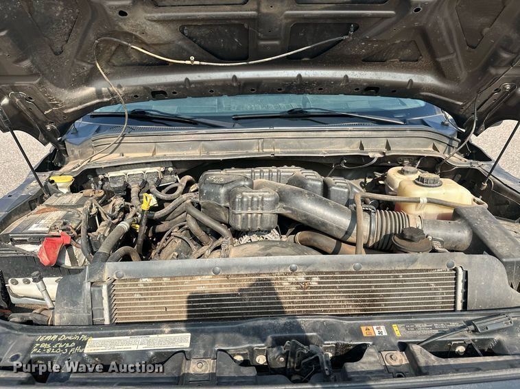 image for item DT6304 2015 Ford F350 Super Duty  Crew Cab flatbed pickup truck