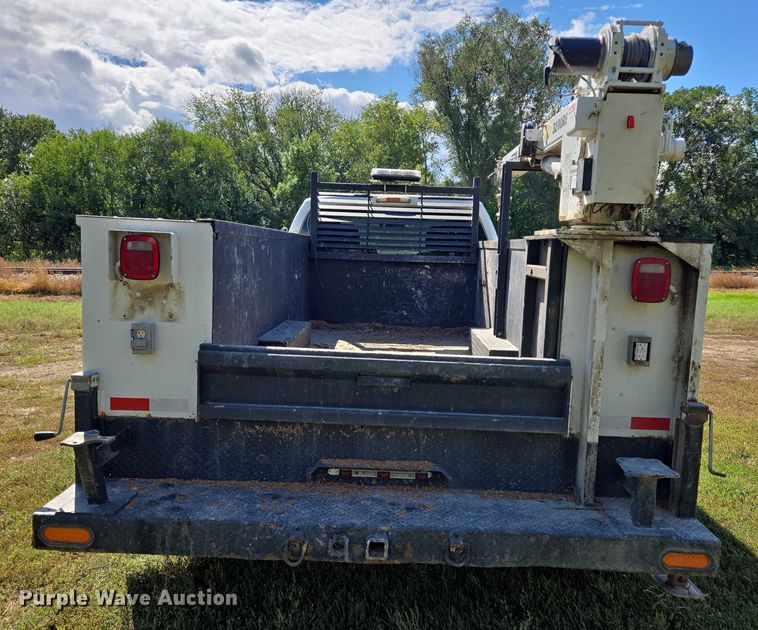 image for item DY1126 2012 Ford F350 Super Duty SuperCab utility bed pickup truck