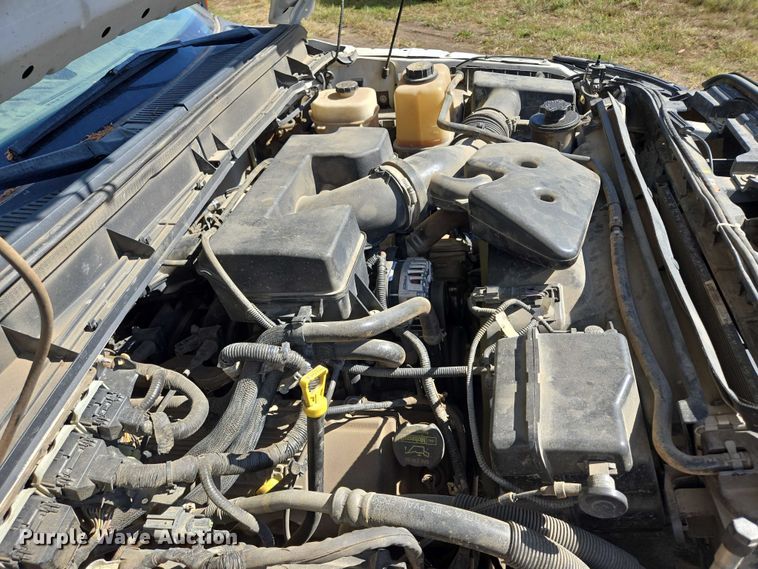 image for item DY1126 2012 Ford F350 Super Duty SuperCab utility bed pickup truck