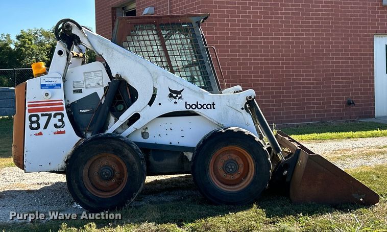 MINI CARGADOR SOBRE RUEDAS 1999 BOBCAT 873