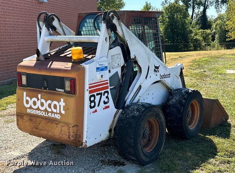 MINI CARGADOR SOBRE RUEDAS 1999 BOBCAT 873