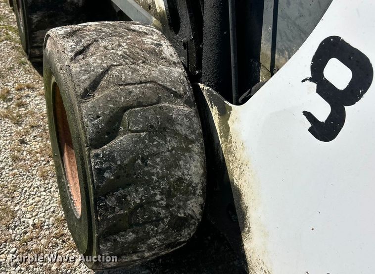 image for item ET3144 1999 Bobcat 873 skid steer loader