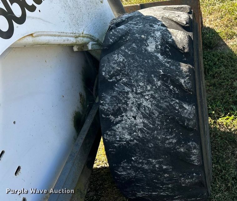 image for item ET3144 1999 Bobcat 873 skid steer loader