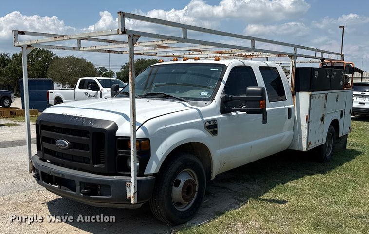 image for item EU0064 2010 Ford F350 Super Duty Crew Cab utility bed pickup truck