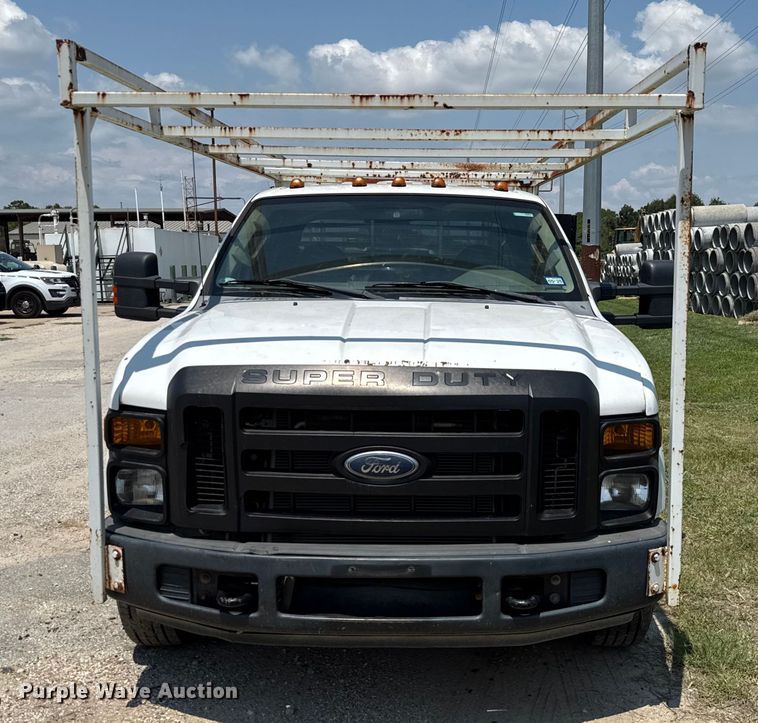 image for item EU0064 2010 Ford F350 Super Duty Crew Cab utility bed pickup truck