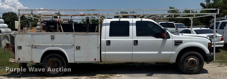 image for item EU0064 2010 Ford F350 Super Duty Crew Cab utility bed pickup truck