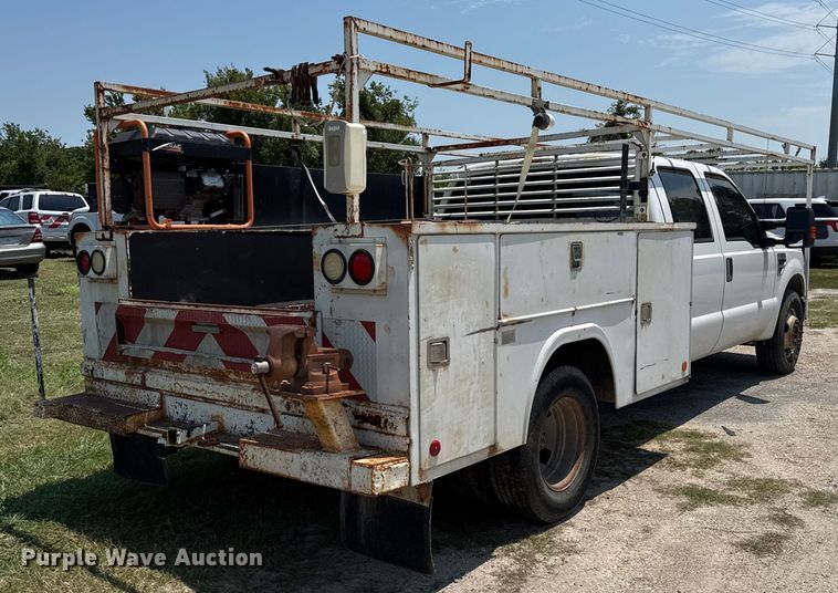 image for item EU0064 2010 Ford F350 Super Duty Crew Cab utility bed pickup truck