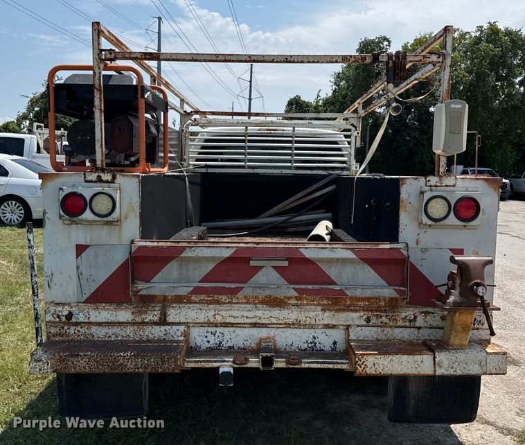 image for item EU0064 2010 Ford F350 Super Duty Crew Cab utility bed pickup truck