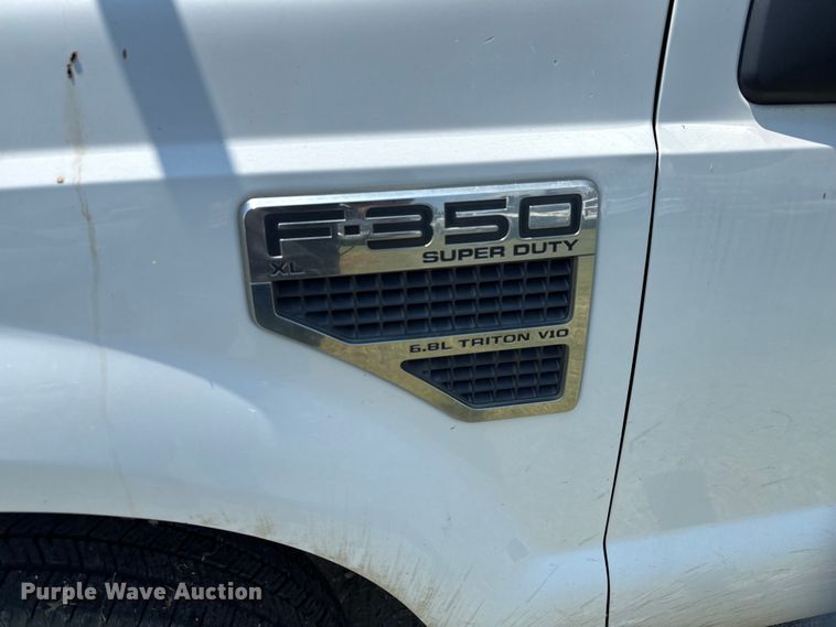 image for item EU0064 2010 Ford F350 Super Duty Crew Cab utility bed pickup truck