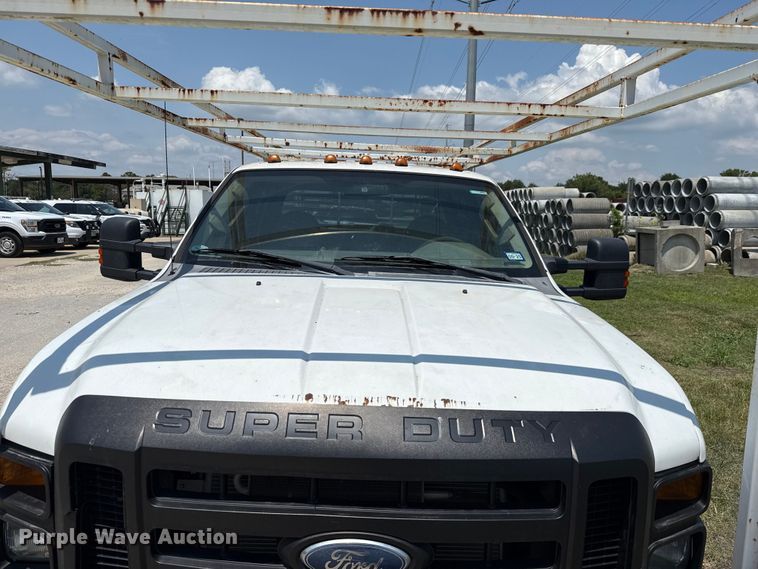 image for item EU0064 2010 Ford F350 Super Duty Crew Cab utility bed pickup truck