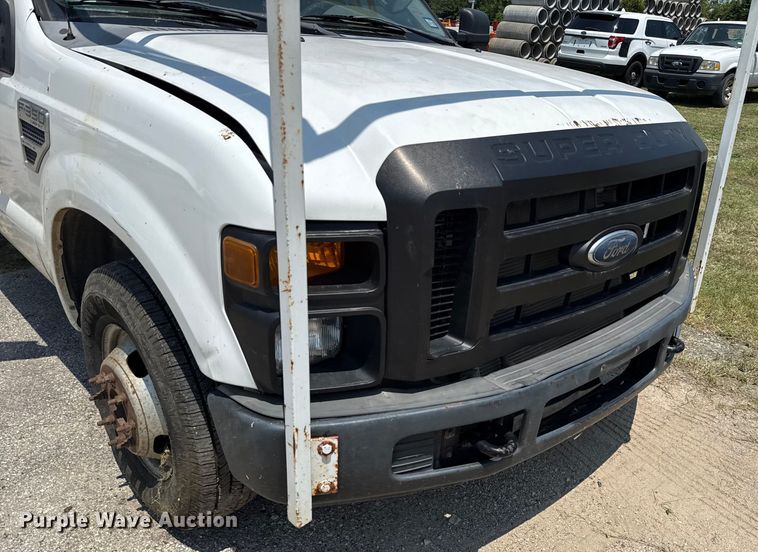 image for item EU0064 2010 Ford F350 Super Duty Crew Cab utility bed pickup truck