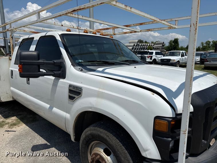 image for item EU0064 2010 Ford F350 Super Duty Crew Cab utility bed pickup truck