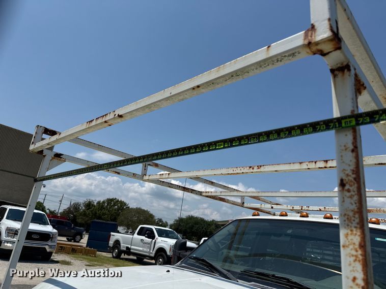 image for item EU0064 2010 Ford F350 Super Duty Crew Cab utility bed pickup truck