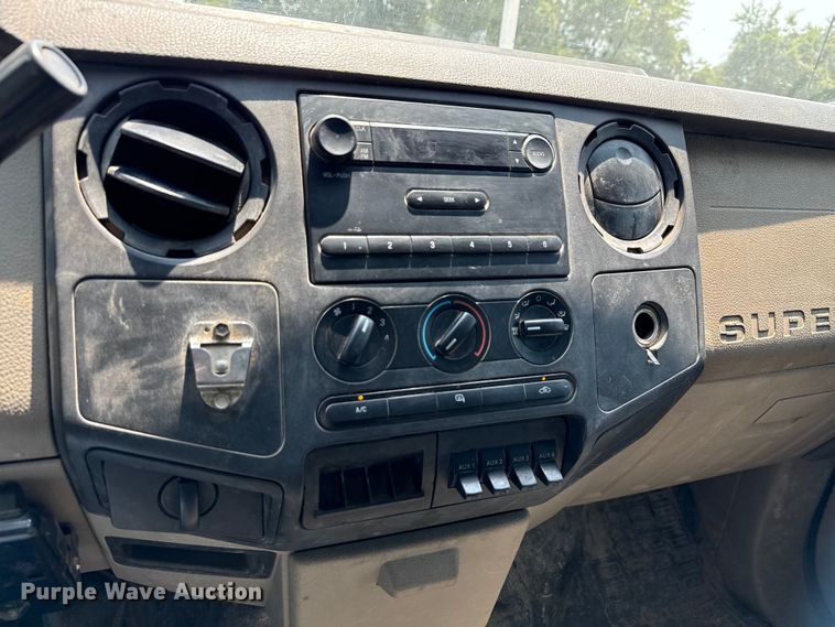 image for item EU0064 2010 Ford F350 Super Duty Crew Cab utility bed pickup truck