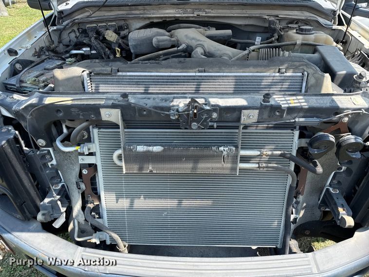 image for item EU0064 2010 Ford F350 Super Duty Crew Cab utility bed pickup truck