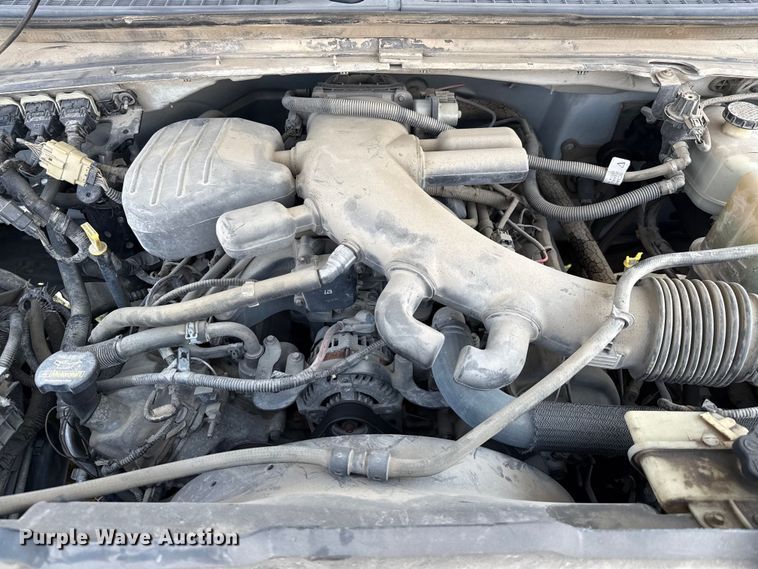 image for item EU0064 2010 Ford F350 Super Duty Crew Cab utility bed pickup truck