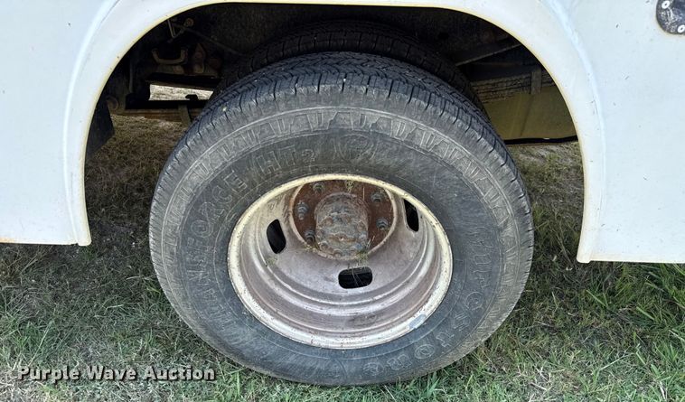 image for item EU0064 2010 Ford F350 Super Duty Crew Cab utility bed pickup truck