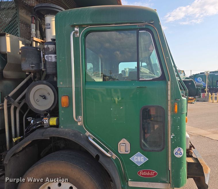 image for item EU4597 2012 Peterbilt 320 refuse truck