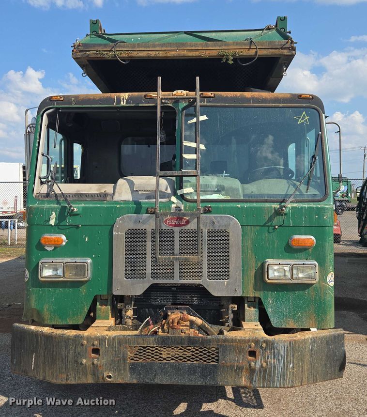 image for item EU4599 2016 Peterbilt 320 refuse truck