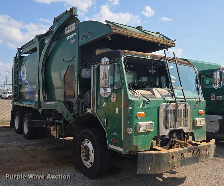 image for item EU4599 2016 Peterbilt 320 refuse truck
