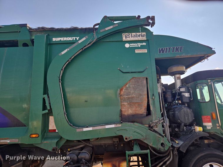 image for item EU4599 2016 Peterbilt 320 refuse truck