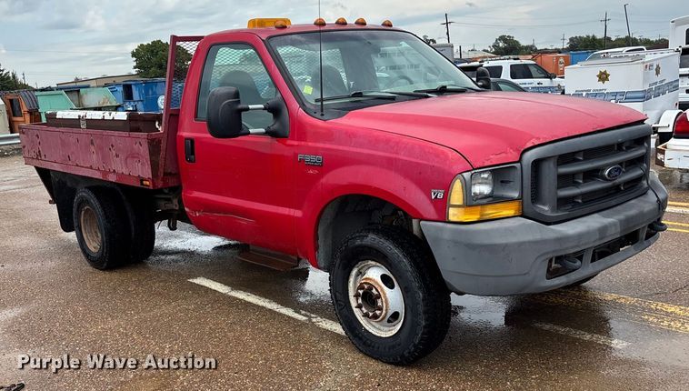 image for item EV1774 1999 Ford F350 Super Duty flatbed pickup truck