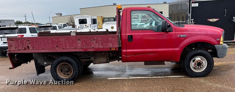 image for item EV1774 1999 Ford F350 Super Duty flatbed pickup truck