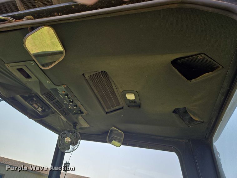 image for item DU6871 2006 John Deere 3830 swather / windrower