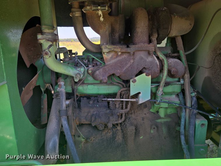 image for item DU6871 2006 John Deere 3830 swather / windrower