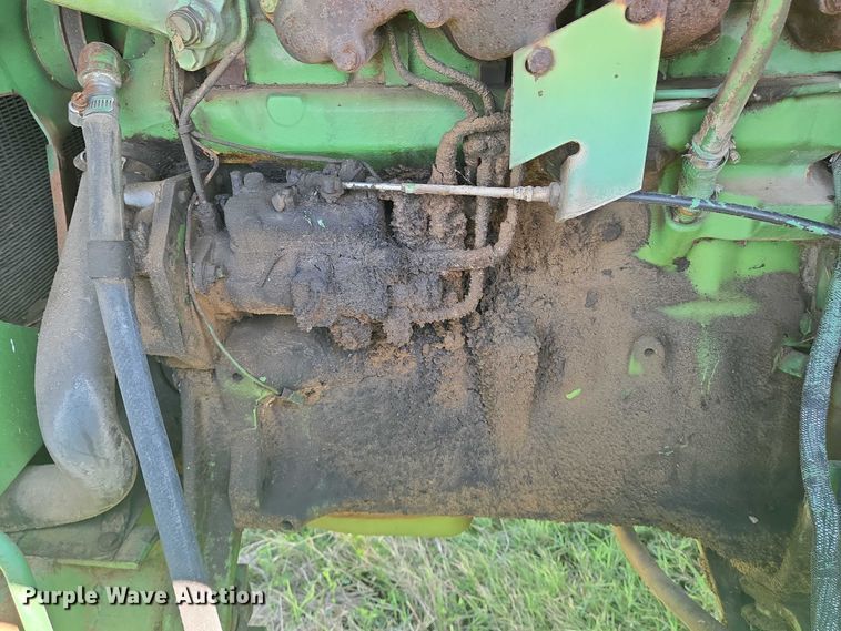 image for item DU6871 2006 John Deere 3830 swather / windrower