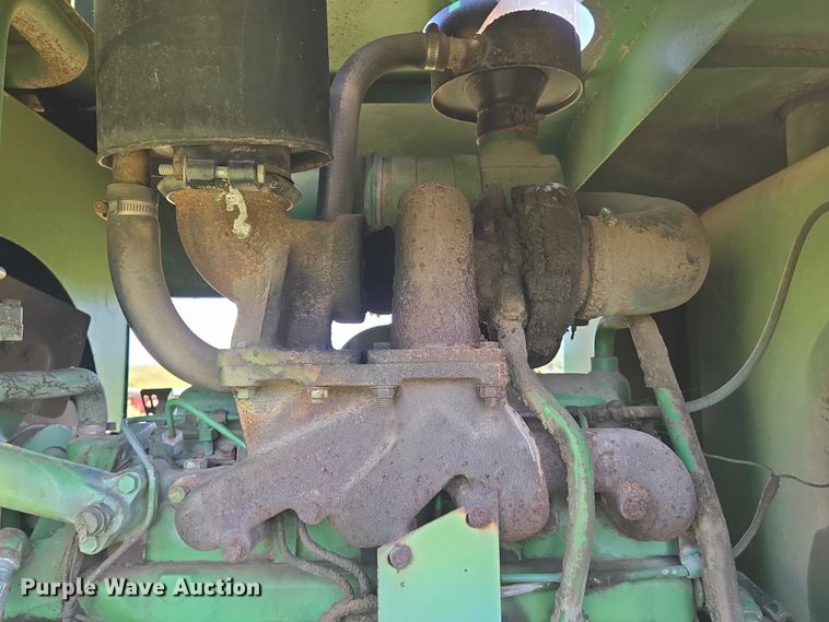 image for item DU6871 2006 John Deere 3830 swather / windrower