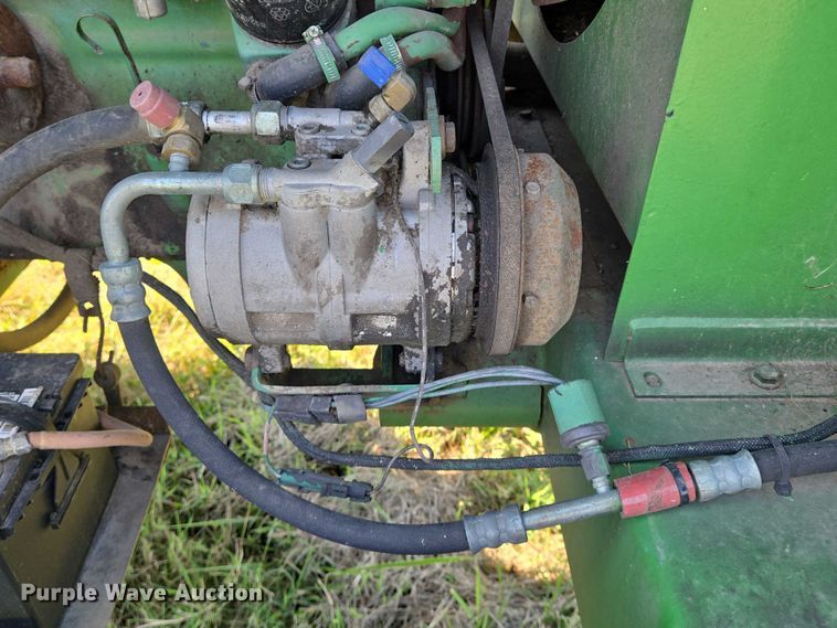 image for item DU6871 2006 John Deere 3830 swather / windrower