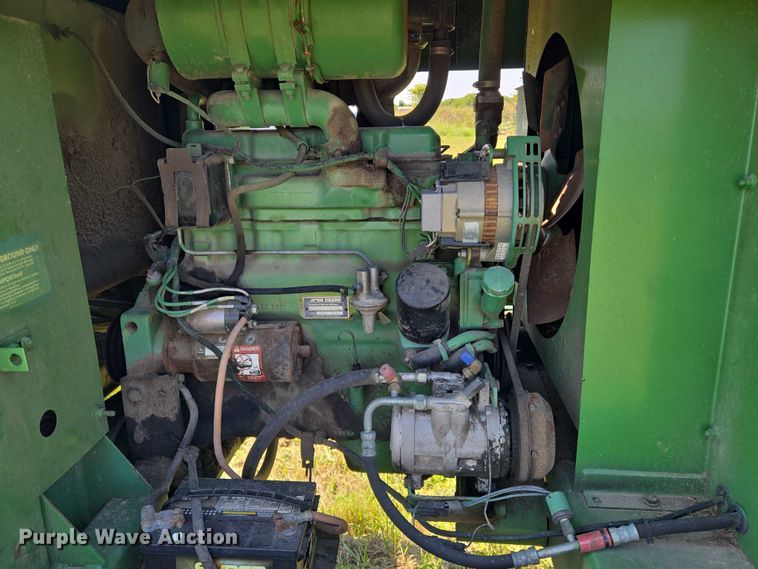 image for item DU6871 2006 John Deere 3830 swather / windrower