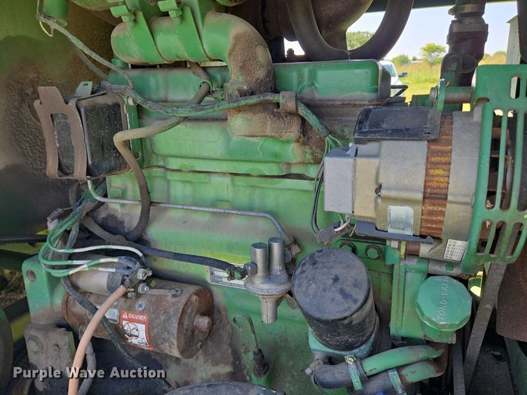 image for item DU6871 2006 John Deere 3830 swather / windrower