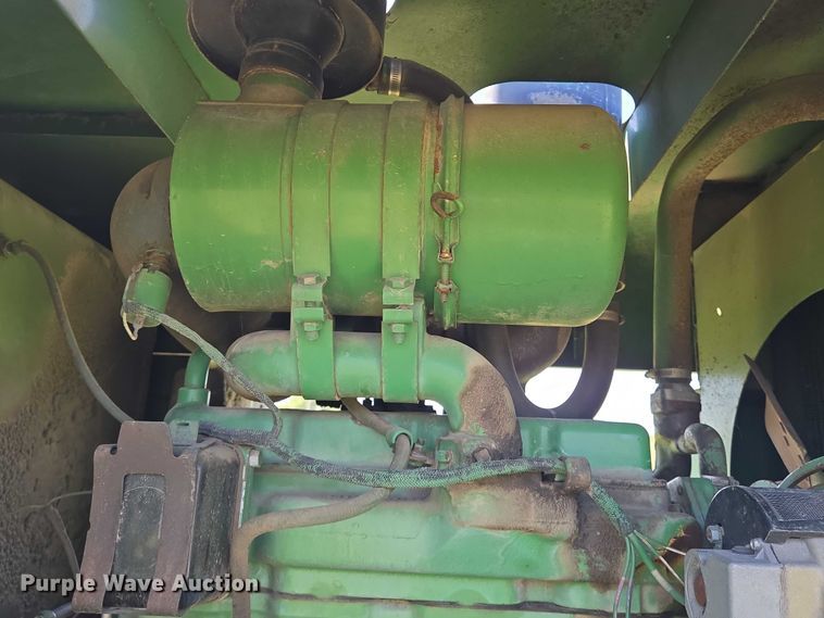image for item DU6871 2006 John Deere 3830 swather / windrower