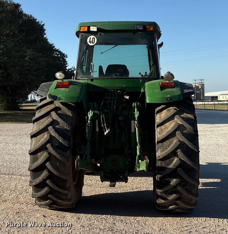 image for item EA7512 1997 John Deere 7810 MFWD tractor