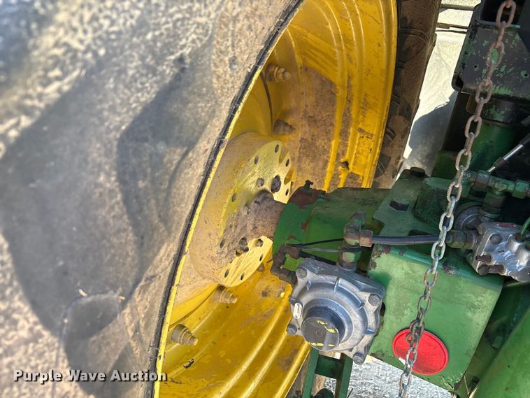 image for item EA7512 1997 John Deere 7810 MFWD tractor