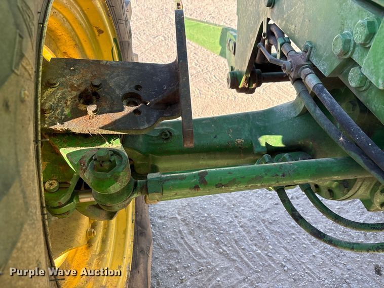 image for item EA7512 1997 John Deere 7810 MFWD tractor