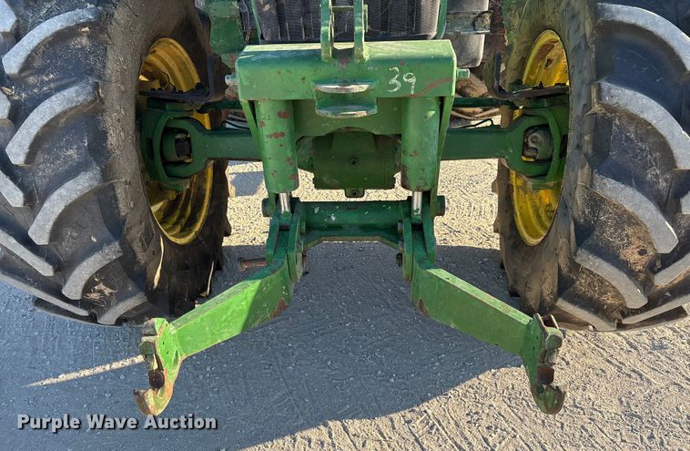 image for item EA7512 1997 John Deere 7810 MFWD tractor